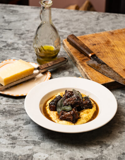 DISH WITH TISH: BRAISED OXTAIL WITH POLENTA, CAVOLO NERO, BONE MARROW & CHILLI